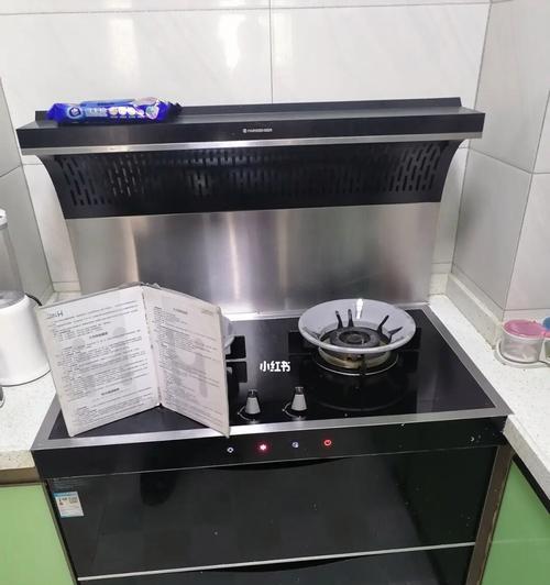 解决油烟机操作面板松动问题的方法（快速修复油烟机操作面板松动）